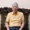Ông Phạm Văn Dẫn, Bí thư chi bộ phố Tân Văn, phường Hoa Lư, tỉnh Ninh Bình, đánh giá việc thực hiện Nghị quyết Đại hội đại biểu toàn quốc lần thứ XIII của Đảng trong dự thảo văn kiện. (Ảnh: Thùy Dung/TTXVN)
