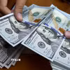 Đồng USD. (Ảnh: AFP/TTXVN)