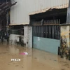 Nhiều nhà dân ở phường Quy Nhơn Đông, Gia Lai bị ngập từ 0,5-1,5m. (Ảnh: Sỹ Thắng/TTXVN)