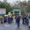 Cảnh sát được triển khai tại trường học ở thành phố Hat Yai, tỉnh Songkhla, Thái Lan sau vụ nổ súng, ngày 11/2/2026. (Ảnh: THX/TTXVN)