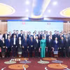 Các đại biểu hai nước tại lễ khai mạc Khóa bồi dưỡng nghiệp vụ chuyên sâu dành cho đội ngũ nhà báo, cán bộ truyền thông của Lào. (Ảnh: Xuân Tú/TTXVN)