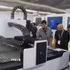 Các đại biểu, chuyên gia, doanh nghiệp trong và ngoài nước tham qua triển lãm. (Ảnh: Đồng Thúy/TTXVN)