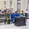 Các bị cáo Trần Thanh Tài và Võ Hoài Vĩnh tại phiên tòa. (Ảnh: TTXVN phát)