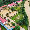 Mưa lớn gây ngập úng khu vực trung tâm xã Lâm Bình, tỉnh Tuyên Quang. (Ảnh: TTXVN phát)