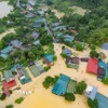 Ngập lụt trên diện rộng ở các phường Hà Giang 1, 2 (Tuyên Quang). (Ảnh: TTXVN phát)