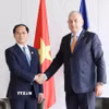 Phó Thủ tướng Bùi Thanh Sơn gặp Cao ủy châu Âu phụ trách Đối tác quốc tế, Jozef Sikela. (Ảnh: Hương Giang/TTXVN)