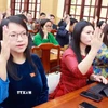 Các đại biểu biểu quyết dừng chủ trương đầu tư dự án Đầu tư xây dựng sân bay Phan Thiết, tỉnh Bình Thuận (cũ). (Ảnh: TTXVN phát)