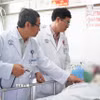 Các bác sỹ Bệnh viện Chợ Rẫy. (Ảnh: TTXVN phát)