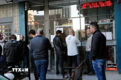 Một quầy giao dịch Bitcoin tại Tel Aviv, Israel. (Ảnh: THX/TTXVN)