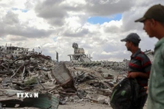 Các tòa nhà bị phá hủy do xung đột tại Khan Younis, Dải Gaza. (Ảnh: THX/TTXVN)