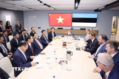 Thủ tướng Phạm Minh Chính thăm Công ty Cybernetica, Estonia. (Ảnh: Dương Giang/TTXVN)