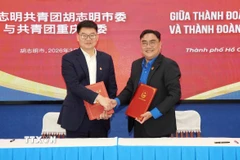 Lễ ký kết Biên bản ghi nhớ hợp tác giữa Thành Đoàn Thành phố Hồ Chí Minh với Thành Đoàn thành phố Trùng Khánh, Trung Quốc. (Ảnh: Trung Tuyến/TTXVN)