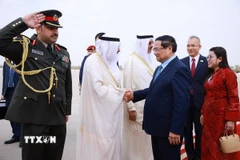 Lễ đón Thủ tướng Phạm Minh Chính cùng Phu nhân bắt đầu chuyến thăm chính thức Kuwait. (Ảnh: Dương Giang/TTXVN)