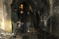 Hiện trường một vụ đánh bom ở thành phố Aleppo ngày 1/1. (Ảnh: THX/TTXVN)