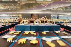 Vàng được bày bán tại thành phố Dương Châu, tỉnh Giang Tô, Trung Quốc. (Ảnh: THX/TTXVN)