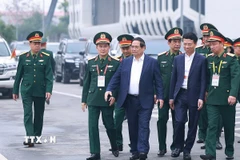 Thủ tướng Phạm Minh Chính làm việc với Bộ Quốc phòng về phát triển công nghiệp quốc phòng công nghệ cao. (Ảnh: Dương Giang/TTXVN)