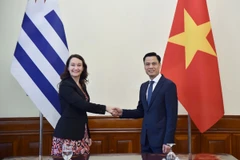Thứ trưởng Bộ Ngoại giao Đặng Hoàng Giang và Thứ trưởng Bộ Ngoại giao Uruguay Valeria Csusaki Cabrera. (Nguồn: Bộ Ngoại giao)