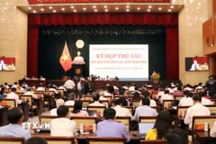 Quang cảnh phiên bế mạc Kỳ họp. (Ảnh: Xuân Khu/TTXVN)