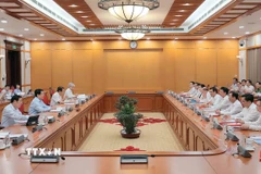 Ủy viên Bộ Chính trị, Chủ tịch nước Lương Cường chủ trì buổi làm việc. (Ảnh: An Đăng/TTXVN)