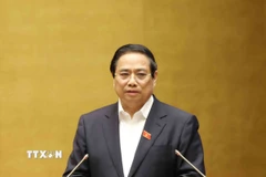 Thủ tướng Phạm Minh Chính trình bày Chuyên đề 1 "Nội dung trọng tâm, cốt lõi của Nghị quyết số 68-NQ/TW, ngày 4/5/2025 của Bộ Chính trị về phát triển kinh tế tư nhân và Kế hoạch hành động thực hiện Nghị quyết." (Ảnh: Phương Hoa/TTXVN)