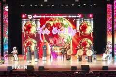 Tiết mục hát quan họ tại chương trình. (Ảnh: Tâm Hằng/TTXVN)