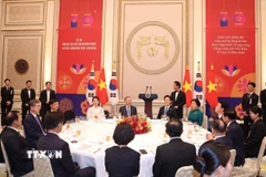 Tổng thống Hàn Quốc Lee Jae Myung và Phu nhân chủ trì Quốc yến chiêu đãi chào mừng Tổng Bí thư Tô Lâm và Phu nhân thăm cấp Nhà nước tới Hàn Quốc. (Ảnh: Thống Nhất/TTXVN)