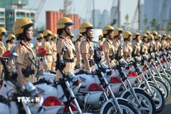 Ra mắt đội hình nữ Cảnh sát Giao thông dẫn đoàn của Công an Thành phố Hồ Chí Minh. (Ảnh: Thành Chung/TTXVN)