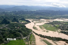 Nước sông Lam khu vực hạ lưu thủy điện Bản Vẻ. (Ảnh: Văn Tý/TTXVN)