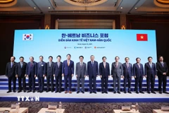 Tổng Bí thư Tô Lâm và Thủ tướng Hàn Quốc Kim Min Seok cùng các đại biểu dự Diễn đàn kinh tế Việt Nam-Hàn Quốc. (Ảnh: Thống Nhất/TTXVN)