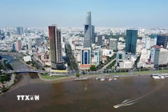 Tòa nhà Bitexco tọa lạc gần sông Sài Gòn, cầu Sài Gòn ở vị trí đắc địa của Thành phố Hồ Chí Minh. (Ảnh: Thanh Vũ/TTXVN)