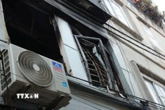 Vụ cháy tại ngôi nhà 3 tầng ở số 87a ngách 99/110/85 Định Công Hạ (Hoàng Mai, Hà Nội) khiến 4 người thương vong. (Ảnh: Hoàng Hiếu/TTXVN)