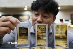 Giá vàng châu Á lập kỷ lục mới trong phiên sáng 26/12. (Ảnh: Yonhap/TTXVN)