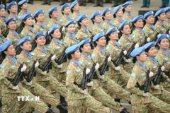 Phụ nữ là bộ phận quan trọng của lực lượng vũ trang, Quân đội nhân dân Việt Nam. (Ảnh: Mạnh Linh/TTXVN)