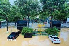 Phố đi bộ Kim Đồng, trung tâm của phường Nùng Trí Cao (Cao Bằng) bị ngập nước. (Ảnh: TTXVN phát)