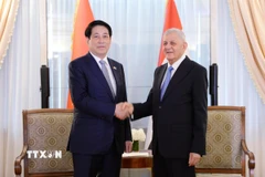 Chủ tịch nước Lương Cường tiếp gặp Tổng thống Iraq Abdul Latif Rashid. (Ảnh: TTXVN)