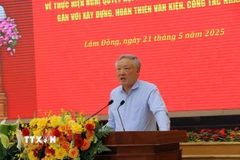 Phó Thủ tướng Thường trực Chính phủ Nguyễn Hòa Bình giao nhiệm vụ cho các tỉnh trong công tác sắp xếp lại đơn vị hành chính. (Ảnh: Chu Quốc Hùng/TTXVN)