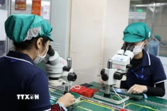 Một doanh nghiệp công nghệ trong Khu công nghiệp Tịnh Phong (Quảng Ngãi). (Ảnh: Quốc Khánh/TTXVN)