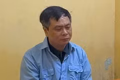 Bị can Phạm Văn Long, Hiệu trưởng trường Cao đẳng Du lịch Hà Nội. (Ảnh: Công an cung cấp)