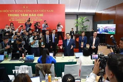 Thủ tướng Phạm Minh Chính thăm Trung tâm báo chí Đại hội Đảng toàn quốc lần thứ XIV. (Ảnh: TTXVN)