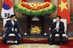 Chủ tịch nước Lương Cường tiếp Chủ tịch Quốc hội Hàn Quốc Woo Won Shik. (Ảnh: Lâm Khánh/TTXVN)