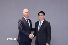 Chủ tịch nước Lương Cường tiếp Tổng Thư ký Phòng Thương mại quốc tế (ICC) John W.H. Denton AO. (Ảnh: Lâm Khánh/TTXVN)