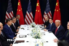 Tổng thống Mỹ Donald Trump (thứ 2, phải) trong cuộc hội đàm với Chủ tịch Trung Quốc Tập Cận Bình (thứ 3, trái) tại Busan, Hàn Quốc ngày 30/10. (Ảnh: Reuters/TTXVN)