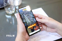 Thông qua nền tảng VNeID, cán bộ, chiến sỹ lực lượng Công an Nhân dân trên cả nước có thể ủng hộ đồng bào vùng bị lũ, lụt khắc phục những thiệt hại nặng nề về người và tài sản, sớm ổn định cuộc sống. (Ảnh: Phạm Kiên/TTXVN)