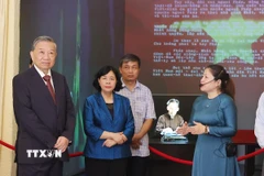 Tổng Bí thư Tô Lâm thăm di tích nhà số 48 Hàng Ngang. (Ảnh: Thống Nhất/TTXVN)