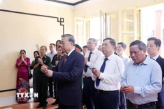 Tổng Bí thư Tô Lâm thăm di tích nhà số 48 Hàng Ngang. (Ảnh: Thống Nhất/TTXVN)