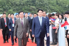 Chủ tịch nước Lương Cường và Tổng Bí thư, Chủ tịch nước Lào Thongloun Sisoulith dự Lễ khánh thành Bến số 3 Cảng quốc tế Lào-Việt. (Ảnh: Lâm Khánh/TTXVN)