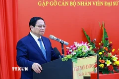 Thủ tướng Phạm Minh Chính phát biểu tại buổi gặp cán bộ, nhân viên, Đại sứ quán và đại diện cộng đồng người Việt Nam tại Malaysia. (Ảnh: Dương Giang/TTXVN)