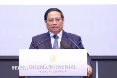 Thủ tướng Phạm Minh Chính phát biểu tại chương trình gặp gỡ doanh nghiệp Việt Nam-Malaysia. (Ảnh: Dương Giang/TTXVN)