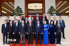 Thủ tướng Chính phủ Phạm Minh Chính và các Phó Thủ tướng Chính phủ, Bộ trưởng, thành viên Chính phủ nhiệm kỳ 2021-2026. (Ảnh: Dương Giang/TTXVN)