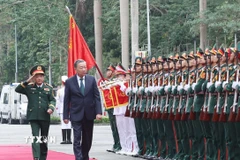 Tổng Bí thư Tô Lâm đến dự lễ kỷ niệm 80 năm Ngày truyền thống Tổng cục Chính trị Quân đội Nhân dân Việt Nam. (Ảnh: Thống Nhất/TTXVN)